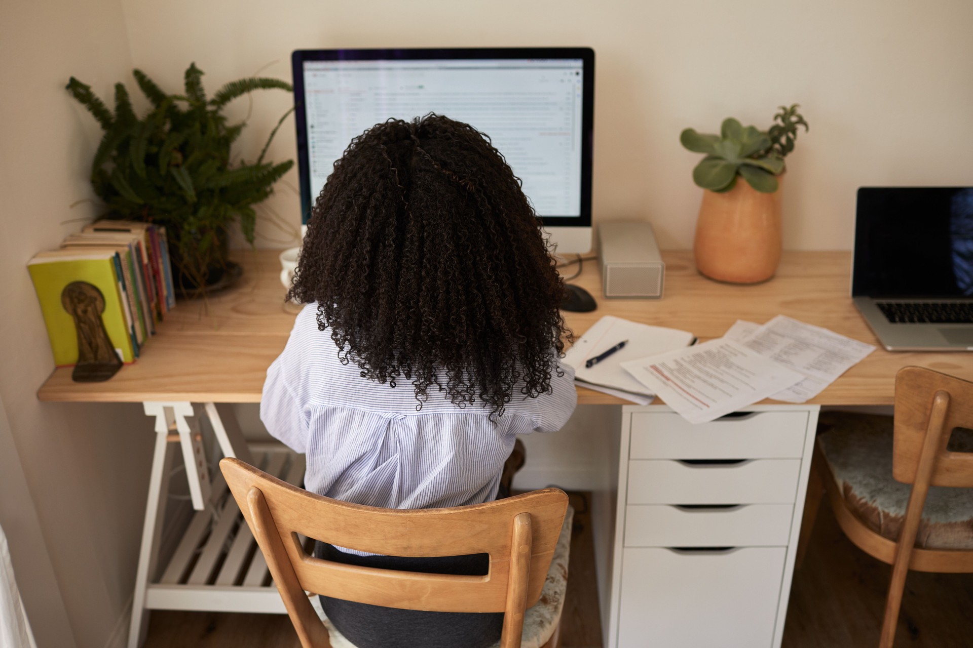 Young businesswoman working on a computer in her home office